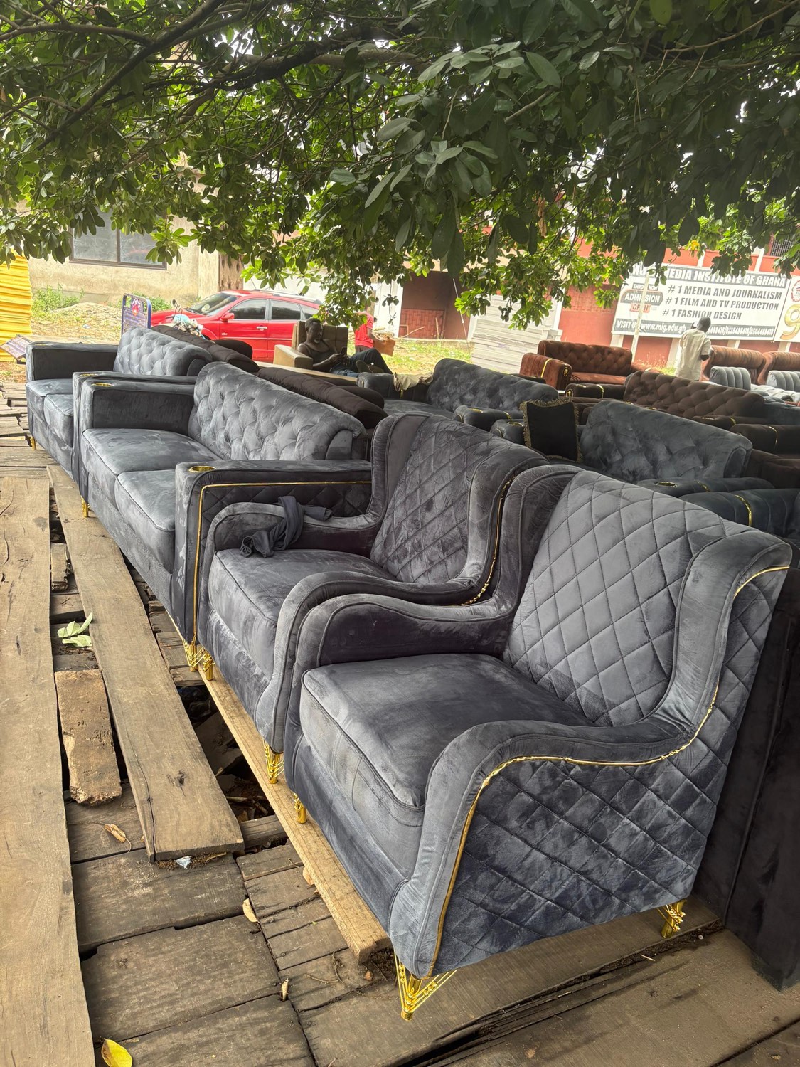 Grey velvet chesterfield suite with gold piping