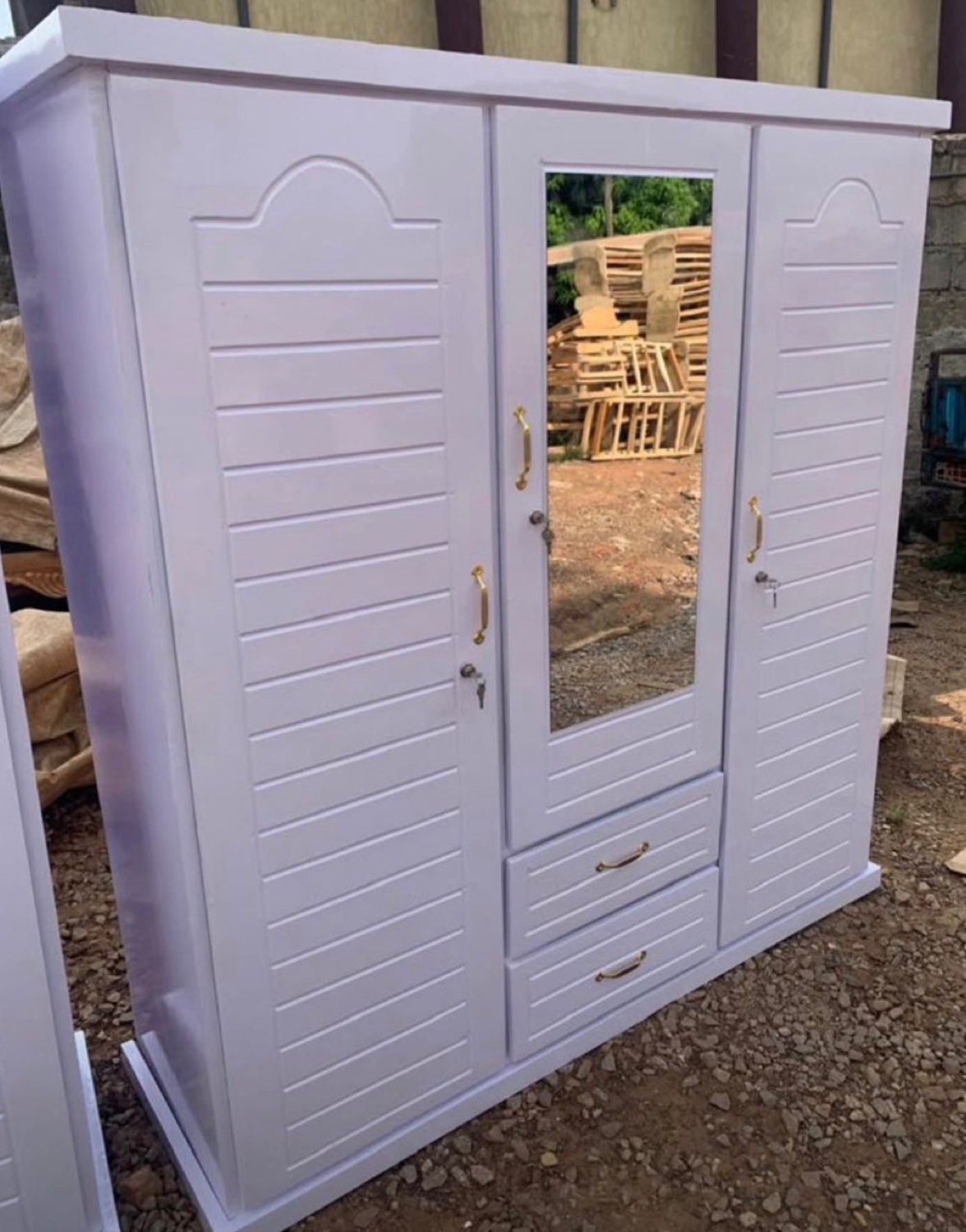 White wardrobe with mirrored doors